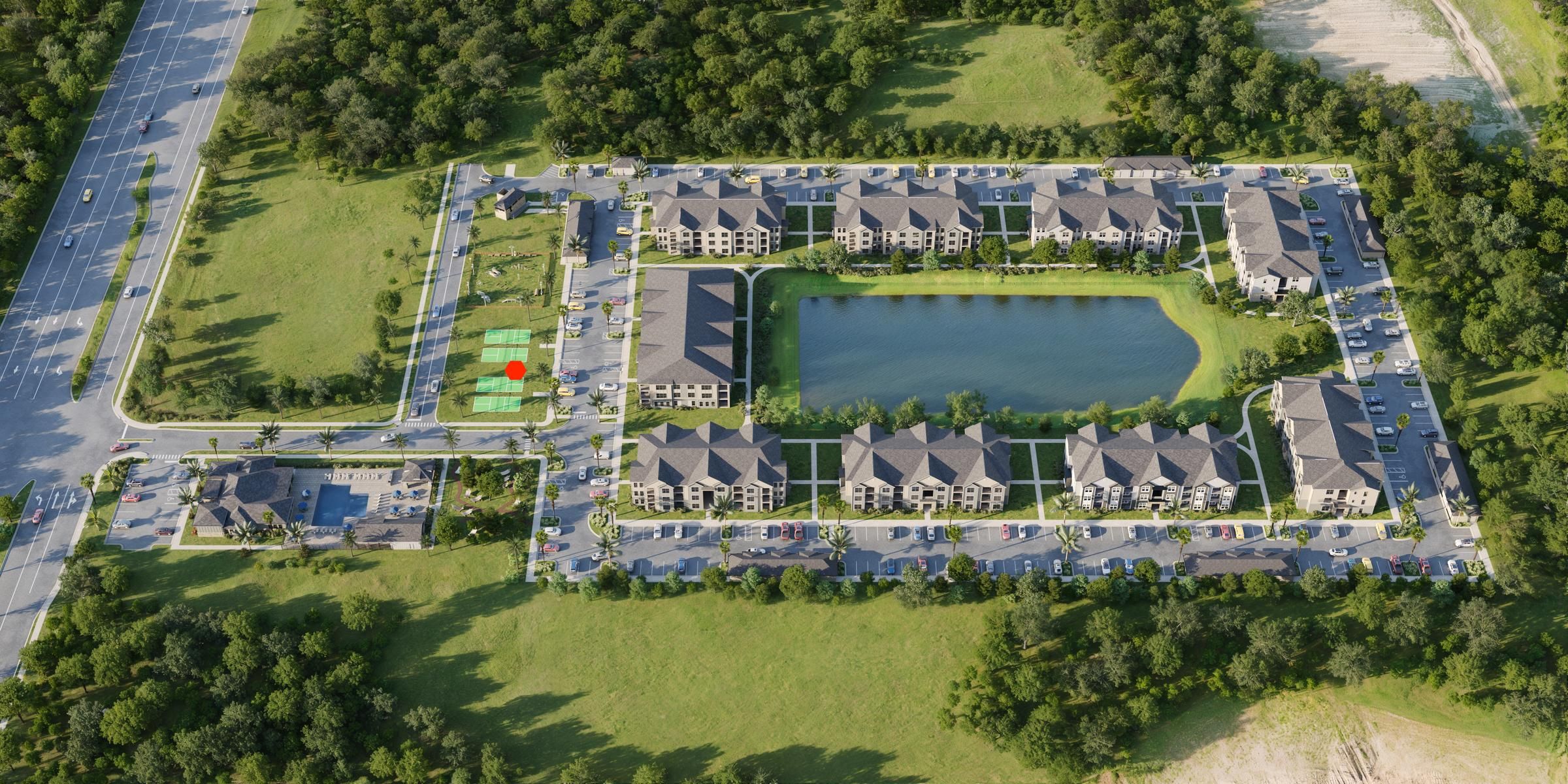 Evolve Grove Park Aerial view of a residential development nestled among lush green trees in a serene woodland setting.